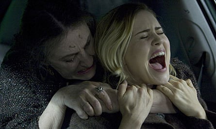 Movie still from Drag Me To Hell (2009)- Christine (Alison Lohman) is being choked by Mrs. Ganush (Lorna Raver)