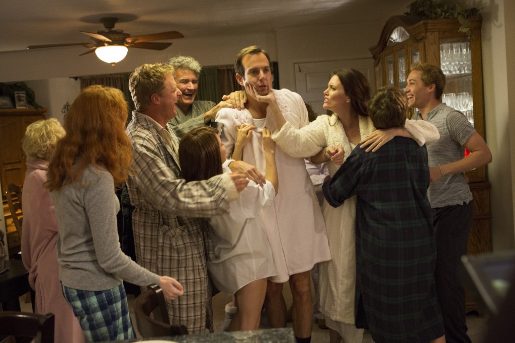 Gob shown standing in the midst of Ann's family celebrating the news of them getting married. Everyone is happy, but Gob is equal parts scared and surprised at the news as he looks straight ahead without any emotions of happiness present. 